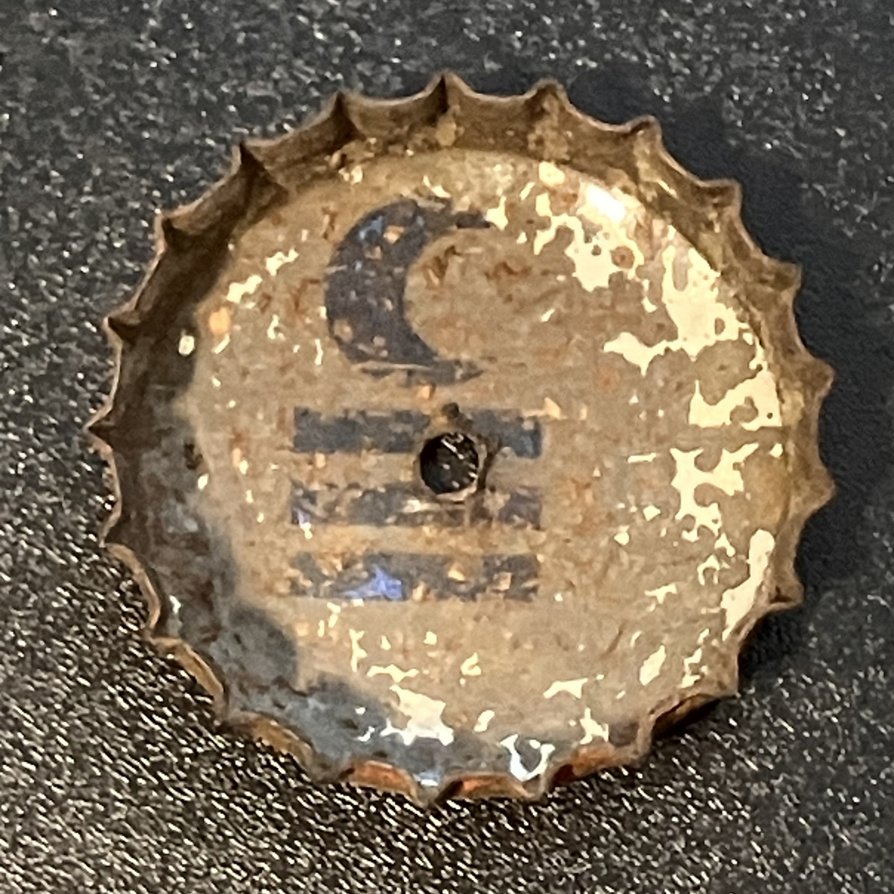 crown-cap liner of unadvertised variant