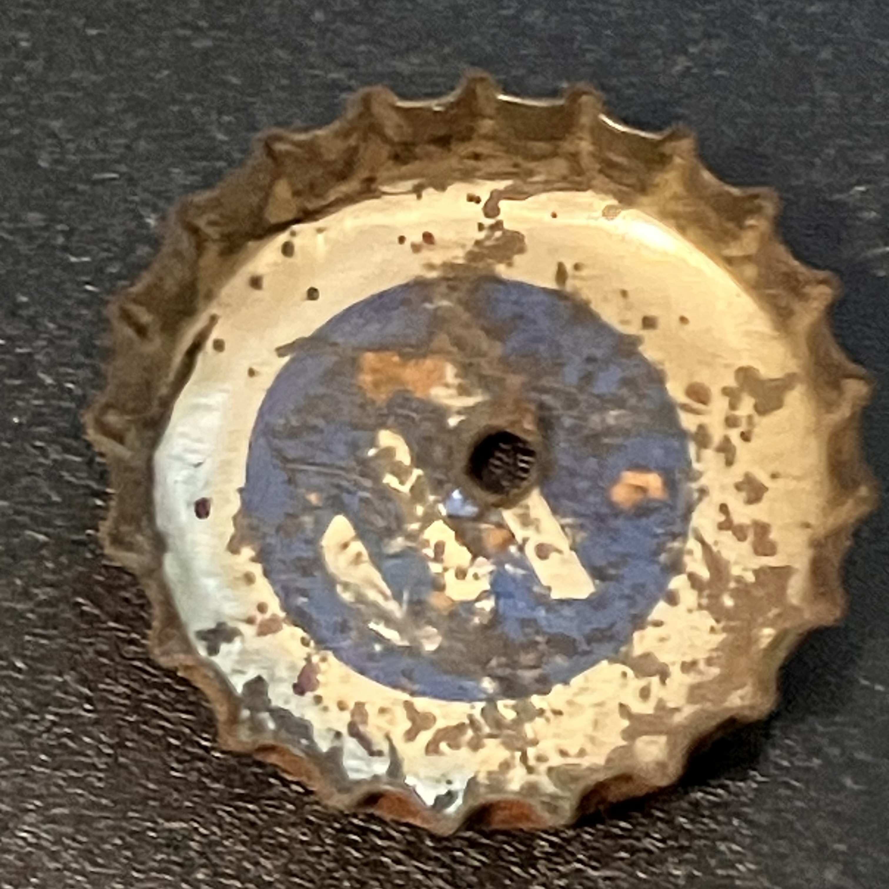 crown-cap liner of unadvertised variant