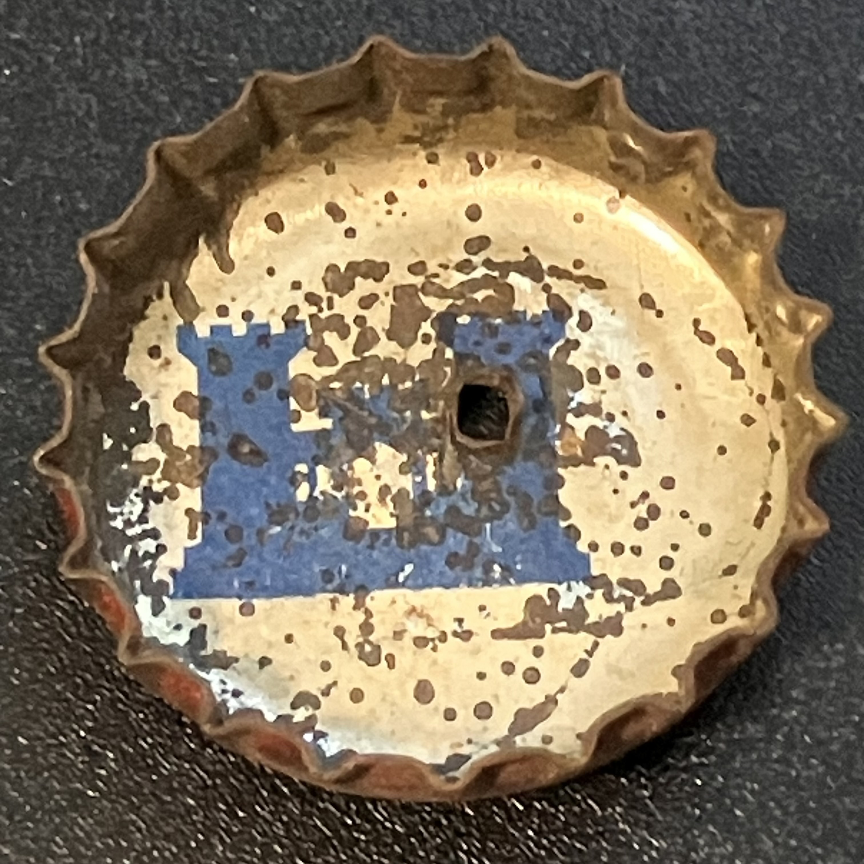 crown-cap liner of unadvertised variant