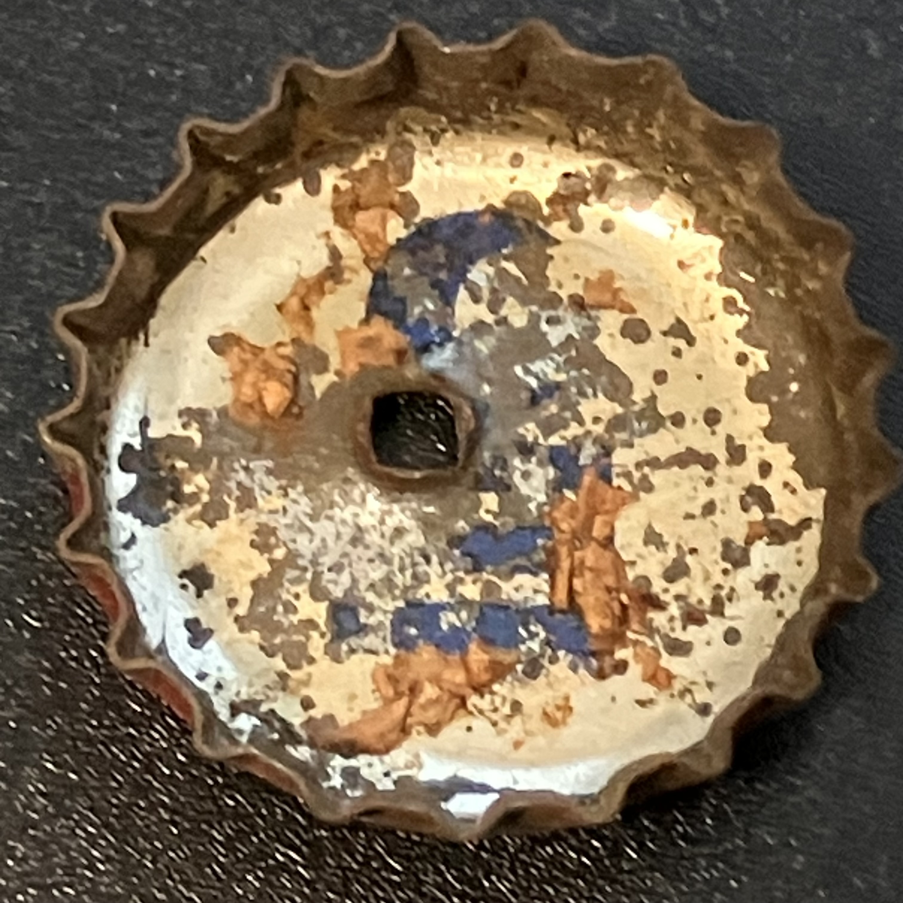 crown-cap liner of unadvertised variant