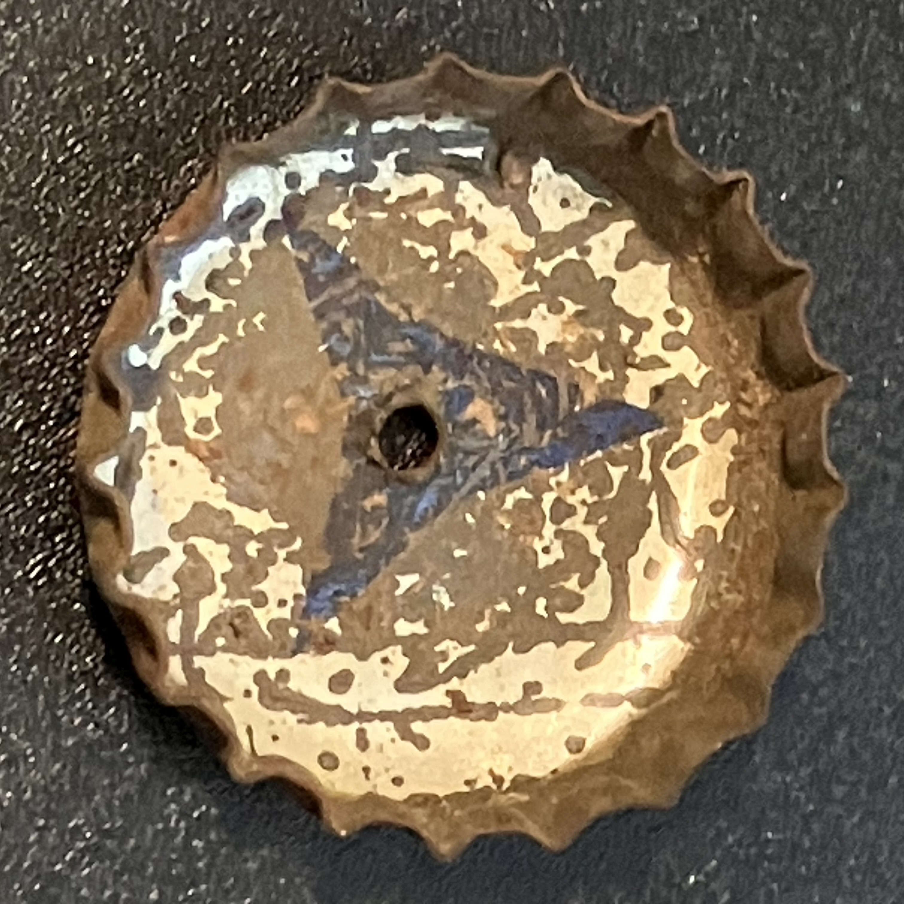 crown-cap liner of unadvertised variant