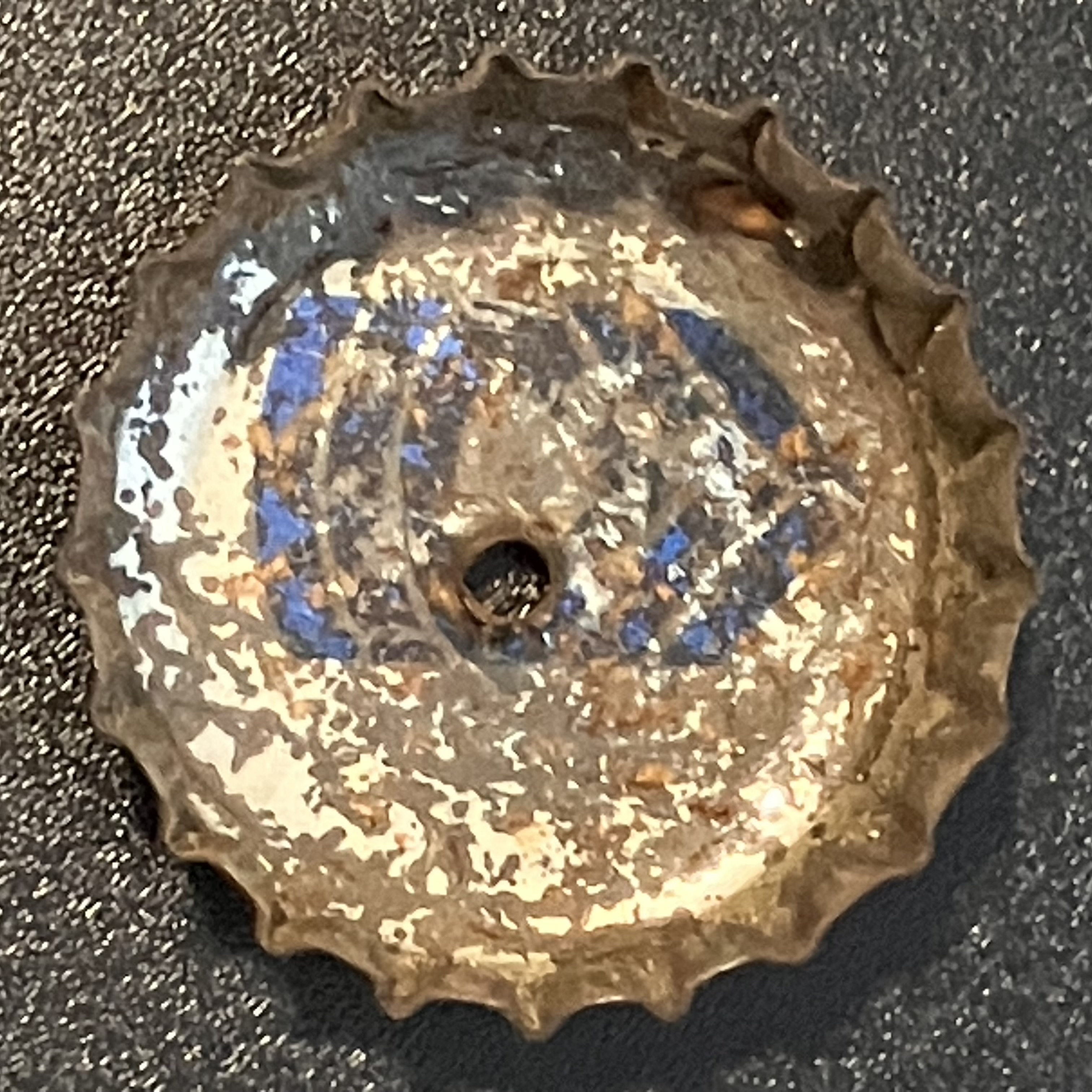 crown-cap liner of unadvertised variant