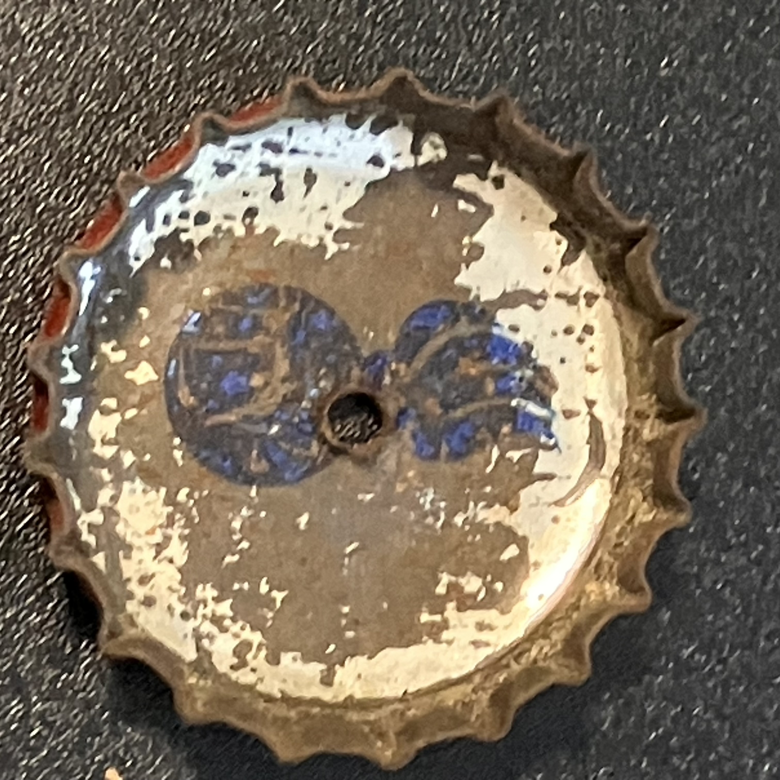 crown-cap liner of unadvertised variant